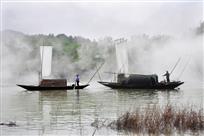 晨雾中的渔帆